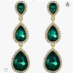 New worn green and gold dangling earrings.